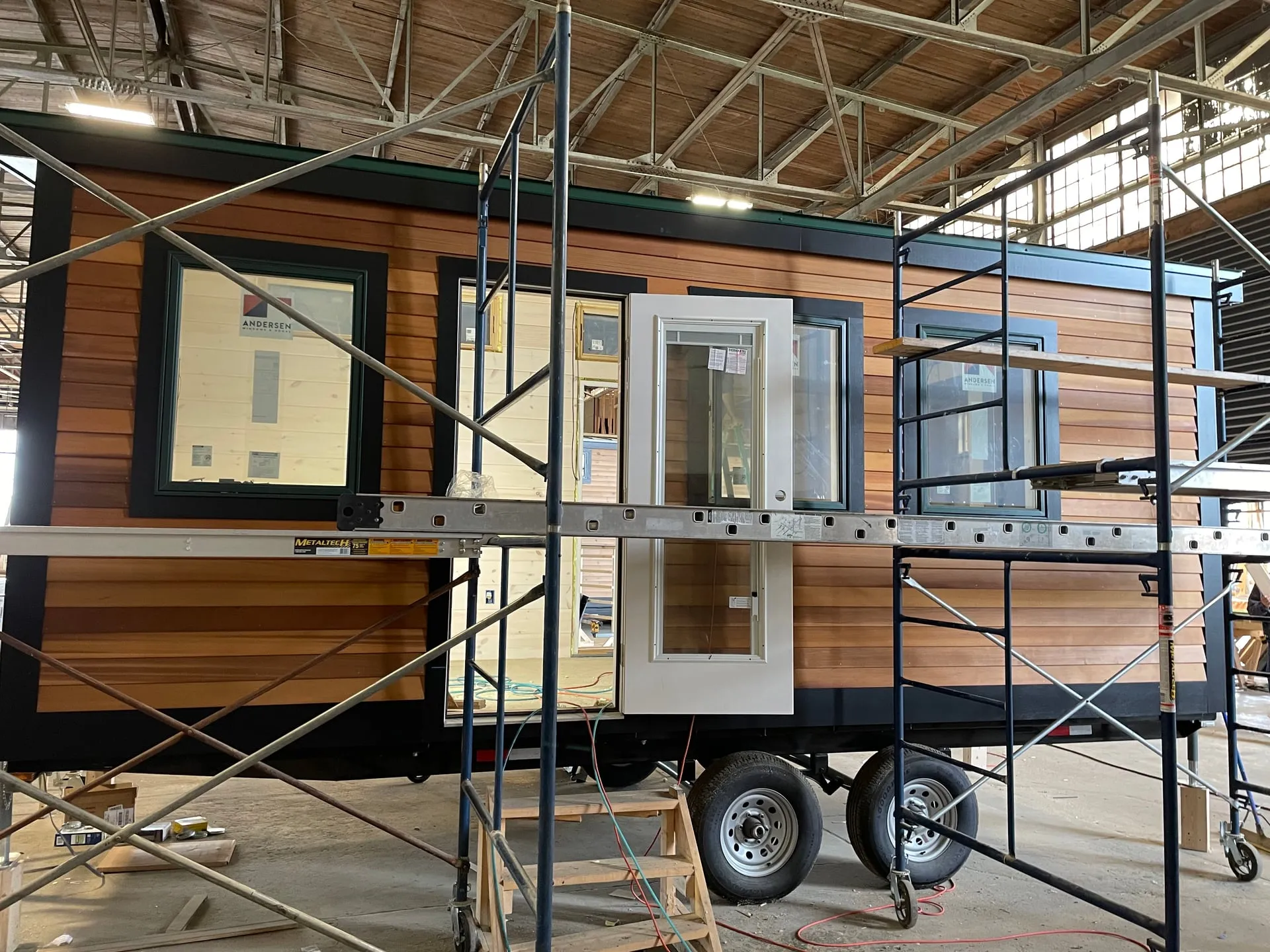 Maine Tiny Homes shop yard — quick-builds and camps